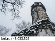 Impenetrable Ancient tower cliff winter. Generate Ai. Стоковое AI-изображение, AI-художник Иван Рябоконь / Фотобанк Лори
