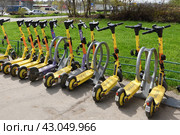Moscow, Russia - Apr 26. 2024. Short-term rental service for electric scooters Yandex Go and Urent in Zelenograd. Редакционное фото, фотограф Володина Ольга / Фотобанк Лори