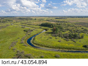 Aerial view of the Kargat River in summer, forests, swamps and boundless expanses of Siberia. Стоковое фото, фотограф Сергей Фролов / Фотобанк Лори