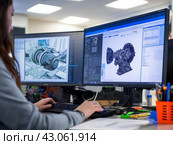 Engineer Analyzing Mechanical Design on Computer Screens. Стоковое AI-изображение, AI-художник Кирилл Черезов / Фотобанк Лори