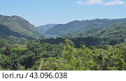 View of the El Nicho valley, beautiful area belonging to the Topes de Collantes national Nature Reserve, Cuba (2024 год). Стоковое видео, видеограф Алексей Кузнецов / Фотобанк Лори