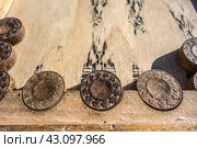 Старинные деревянные резные нарды крупным планом. Игры на улице, во дворе./ Old wooden backgammon. Backgammon chips close-up on the board. Стоковое фото, фотограф Iva Noel / Фотобанк Лори