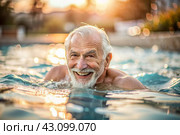 An elderly man swims and does water aerobics in a heated pool, a happy and smiling pensioner. Recreational water sports. Стоковое AI-изображение, AI-художник Photojuli / Фотобанк Лори