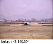 Luang Prabang / Laos - 26 Feb 2012: The airplane of Lao Airlines in Luang Prabang, Laos. Редакционное фото, фотограф Сергей Стрелков / Фотобанк Лори