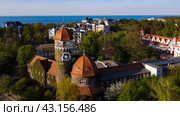 Svetlogorsk, Russia - May 1, 2024: Water tower Rauschen top ariel view. Редакционное фото, фотограф Наталья Симакова / Фотобанк Лори