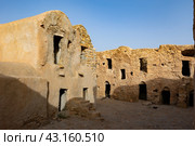 Ruins of Berber granary structures in Ksar Daghar in Tunisia. Стоковое фото, фотограф Яков Филимонов / Фотобанк Лори