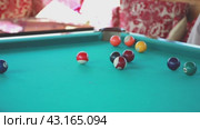 A man plays billiards: skill on green cloth. Стоковое видео, видеограф Юрий Поздников / Фотобанк Лори