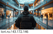 Police Officer Standing in Shopping Mall. Стоковое AI-изображение, AI-художник Юлия Гапеенко / Фотобанк Лори