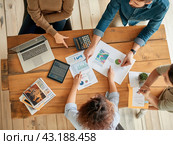 Team Collaboration on Business Reports. Стоковое AI-изображение, AI-художник Кирилл Черезов / Фотобанк Лори
