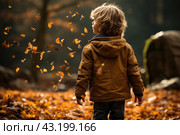 Little boy having fun during stroll in the forest at sunny autumn day. Child playing maple leaves. Baby tossing the leaves up. Active family time on nature. Hiking with little kids. Dry leaves rustle. Стоковое AI-изображение, AI-художник Ирина Михайличенко / Фотобанк Лори