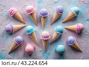 Sweet dessert. Ice cream cones with different flavors. Blue, pink, purple ice cream on a background of three pastel colors: blue, pink and purple. Стоковое AI-изображение, AI-художник Photojuli / Фотобанк Лори