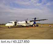 Luang Prabang / Laos - 27 Feb 2012: The airplane of Lao Airlines in Luang Prabang, Laos. Редакционное фото, фотограф Сергей Стрелков / Фотобанк Лори