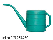 Green plastic garden watering can isolated on white background. Стоковое фото, фотограф Сергей Н / Фотобанк Лори