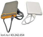 Внешний жесткий диск на белом фоне. External portable hard drive, isolated on a white background. Стоковое фото, фотограф Татьяна Д / Фотобанк Лори