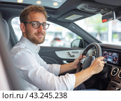 Man Driving a Modern Car. Стоковое AI-изображение, AI-художник Кирилл Черезов / Фотобанк Лори