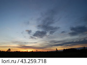 Spring sunset over the field. Стоковое фото, фотограф Andrew_Swarga / Фотобанк Лори