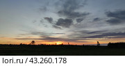 Spring sunset over the field. Стоковое фото, фотограф Andrew_Swarga / Фотобанк Лори