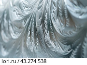Winter frost patterns on glass. Ice crystals. Abstract light blank cold winter background or wallpaper. Frost patterns on frozen window. Frosted glass. Freezing effect. Frostwork. Harsh season. Cold. Стоковое AI-изображение, AI-художник Марина Демидюк / Фотобанк Лори