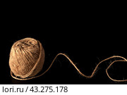 Yarn and wooden knitting needles on a black background. Стоковое фото, фотограф Алиев Аслан / Фотобанк Лори
