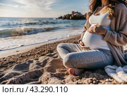 Relaxation, peace of mind, sea air. Close-up of the tummy. A pregnant woman on the beach by the sea. The concept of pregnancy, childbirth and parental responsibilities. Стоковое AI-изображение, AI-художник Photojuli / Фотобанк Лори