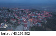 Evening aerial view of town of Sighnaghi, Kakheti region of Georgia. Стоковое видео, видеограф Яков Филимонов / Фотобанк Лори