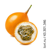 Yellow passion fruit or granadilla isolated on white. Стоковое фото, фотограф Катерина Ковалева / Фотобанк Лори