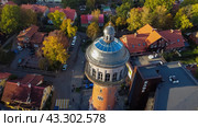 Zelenogradsk, Russia - October 9, 2022: water tower Cranz top ariel view. Редакционное фото, фотограф Наталья Симакова / Фотобанк Лори