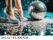 Women's legs in luxurious shiny pumps with heels at a party or disco on the background of a silver mirrored disco ball. The queen of the dance floor. Стоковое AI-изображение, AI-художник Photojuli / Фотобанк Лори