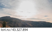 Mountain lake time lapse in summer or autumn. Wild nature and beautiful sunset. Moving clouds, deep twilight and dramatic sky. Стоковое видео, видеограф Александр Маркин / Фотобанк Лори
