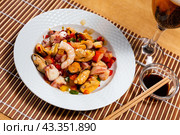 Popular Spanish appetizer, seafood salpicon, is served on plate. Стоковое фото, фотограф Яков Филимонов / Фотобанк Лори
