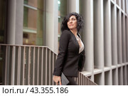Caucasian businesswoman with digital tablet outdoors. Стоковое фото, фотограф Raquel Corcoles Mendez / Фотобанк Лори
