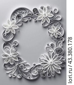 Paper flowers crafted using the quilling technique. The flowers are in shades of gray and white and are arranged in a circular pattern on a grey background. Frame with copy space. AI generated. Стоковое AI-изображение, AI-художник Юлия Петровская / Фотобанк Лори