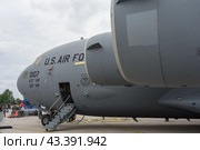 BERLIN - JUNE 05, 2024: The strategic and tactical airlifter McDonnell Douglas/Boeing C-17 Globemaster III. US Air Force. ILA Berlin Air Show 2024. Редакционное фото, фотограф Sergey Kohl / Фотобанк Лори
