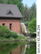 Watermill. The water supply chute to the mill wheel. Ethno-cultural tourist complex "Nanosy Rest" (2024 год). Редакционное фото, фотограф Vadzim Yakubovich / Фотобанк Лори