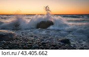 Sea storm with splash from waves on rocky shore. Стоковое фото, фотограф Дмитрий Попов / Фотобанк Лори