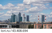 Moscow, Russia June 22, 2024: Timelapse of Moscow City skyscrapers from the observation deck of the Academy of the Russian Academy of Sciences. Редакционное видео, видеограф Igor Skripachev / Фотобанк Лори