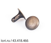 Metal eyelet isolated on a white background. Стоковое фото, фотограф Елена  Попкова / Фотобанк Лори