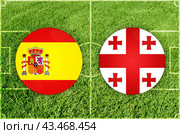 Spain vs Georgia football match. Стоковая иллюстрация, иллюстратор Jan Jack Russo Media / Фотобанк Лори