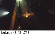 Drone on a section of a city road under repair at night. Стоковое видео, видеограф Aleksey Kidisyuk / Фотобанк Лори