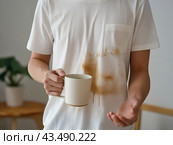 Person with Coffee-Stained White Shirt. Стоковое AI-изображение, AI-художник Кирилл Черезов / Фотобанк Лори