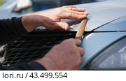 Car body shop. Repair man processes the welding seam using an angle grinder on replaced car part. Professional Body master grind old paint and rust. Rusty damage. Rusting car. Hands with tool close-up. Стоковое видео, видеограф Марина Демидюк / Фотобанк Лори