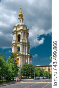 The bell tower with the Church of St. Sergius of Radonezh, 1787, architect I.Zherebtsov, landmark, Novospassky Stavropigial Male Monastery: Moscow, Russia - 08 June, 2024. Редакционное фото, фотограф Алексей Голованов / Фотобанк Лори