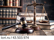 Justice and the law. A wooden hammer, books and scales on the table. The court session. Стоковое AI-изображение, AI-художник Photojuli / Фотобанк Лори