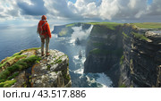 Hiker on the Cliffs of Moher in County Clare, Ireland, During a Cloudy Afternoon. Стоковое AI-изображение, AI-художник Юлия Гапеенко / Фотобанк Лори