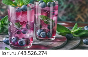 Refreshing cocktail with blueberries and mint. Стоковое AI-видео, аниматор Юрий Поздников / Фотобанк Лори