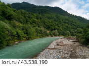 View of the Bolshoy Zelenchuk River in the northern foothills of the Caucasus Mountains near the village of Nizhny Arkhyz on a summer day, Karachay-Cherkessia, Russia. Стоковое фото, фотограф Ula Ulachka / Фотобанк Лори