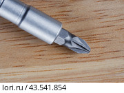 Screwdriver on a wooden table. Close up. Стоковое фото, фотограф Михаил Строгалев / Фотобанк Лори