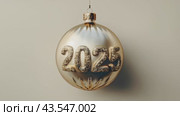 Christmas greeting card with golden Christmas tree ball and text 2025, garland lights and Christmas tree on festive background. Slow motion footage. Happy New Year holidays. Стоковое AI-видео, аниматор Ирина Михайличенко / Фотобанк Лори