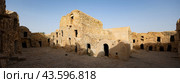 Ruins of Berber granary structures in Ksar Daghar in Tunisia. Стоковое фото, фотограф Яков Филимонов / Фотобанк Лори