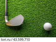 A banner with a view of a green lawn, on which lies a white ball and a metal golf club. An advertisement for a golf game at a country club. Free space for text. Стоковое AI-изображение, AI-художник Photojuli / Фотобанк Лори